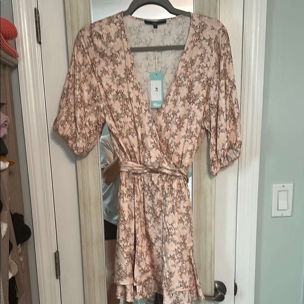 Chic Floral Wrap Mini Dress in pink by [Brand]